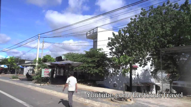 my xe buyt bus from Gua Lai arriving at  Kon Tum  city   Vietnam